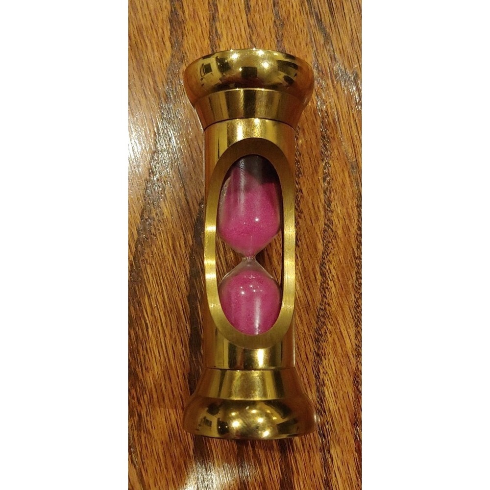 Vintage Pivoting 3 minute Hourglass Solid Brass Swiss Made Brass And Heavy.